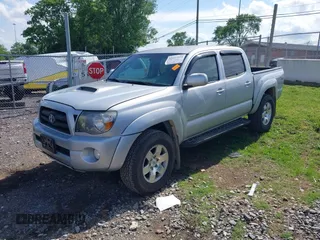 2009 Toyota Tacoma with VIN 3TMLU42N19M034332, listed as a IAAI auction lot 42157119 with 195,272 mi miles and . Bid and sale history available at DreamBid. Image 2.