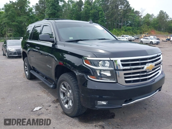 2017 Chevrolet Tahoe LT z VIN 1GNSKBKC8HR311969, wystawiony jako IAAI lot #42126414 z przebiegiem 160 994 mil mil oraz . Historia ofert i sprzedaży dostępna na DreamBid. Obrazek 1.