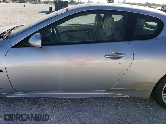 2013 Maserati GranTurismo Sport with VIN ZAM45VLA8D0067421, listed as a Copart auction lot 69464472 with Not provided miles and Salvage title. Bid and sale history available at DreamBid. Image 7.