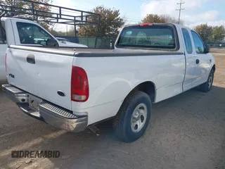 2002 Ford F-150 XL with VIN 1FTRX17W82NB78988, listed as a IAAI auction lot 41490173 with 1 mi miles. Bid and sale history available at carsss.com. Image 4.