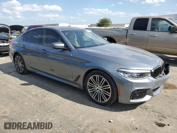 2020 BMW 5 Series with VIN WBAJB1C04LCD11871, listed as a Copart auction lot 66960324 with 4,850 mi miles and Salvage title. Bid and sale history available at DreamBid. Image 4.