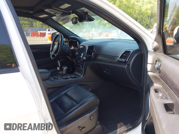 2021 Jeep Grand Cherokee Overland with VIN 1C4RJFCG3MC502165, listed as a IAAI auction lot 42404863 with 100,197 mi miles and . Bid and sale history available at DreamBid. Image 5.