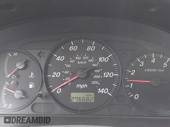 2000 Mazda Protege DX with VIN JM1BJ2220Y0258658, listed as a IAAI auction lot 41622579 with 276,682 mi miles and . Bid and sale history available at DreamBid. Image 7.