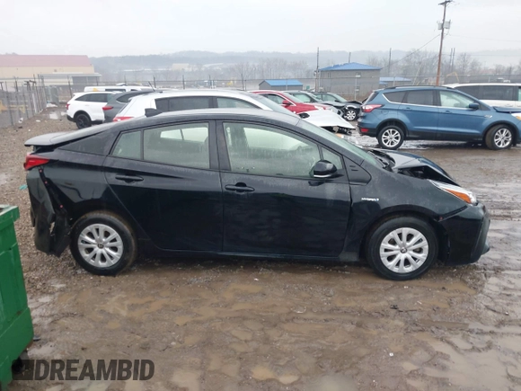 2021 Toyota Prius L Eco with VIN JTDKAMFU5M3145210, listed as a IAAI auction lot 41482234 with 85,600 mi miles and . Bid and sale history available at DreamBid. Image 14.