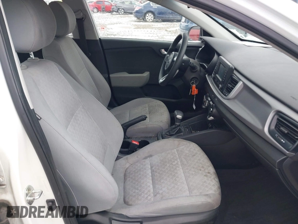2018 Kia Rio LX with VIN 3KPA24AB8JE057223, listed as a IAAI auction lot 41705738 with 97,674 mi miles. Bid and sale history available at carsss.com. Image 5.