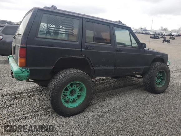 1993 Jeep Cherokee Sport with VIN 1J4FJ68S6PL506709, listed as a Copart auction lot 86638434 with 253,923 mi miles and Salvage Title. Bid and sale history available at carsss.com. Image 3.