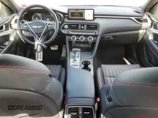 2023 Genesis G70 2.0T with VIN KMTG34TA5PU112928, listed as a Copart auction lot 74965654 with 17,963 mi miles and Salvage Title. Bid and sale history available at carsss.com. Image 8.