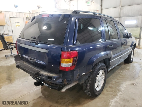 2002 Jeep Grand Cherokee Laredo with VIN 1J8GW48S92C197903, listed as a Copart auction lot 70524292 with 152,286 mi miles and Non Repairable. Bid and sale history available at carsss.com. Image 4.