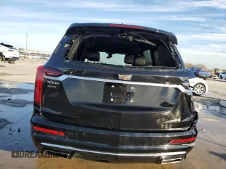 2023 Cadillac XT6 FWD Premium Luxury z VIN 1GYKPCRS6PZ127331, wystawiony jako Copart lot #88802755 z przebiegiem 47 796 mil mil oraz Szkoda całkowita • Salvage title. Historia ofert i sprzedaży dostępna na DreamBid. Obrazek 6.