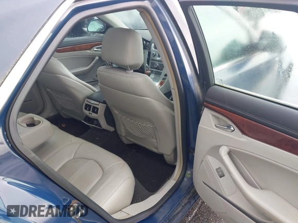 2009 Cadillac CTS AWD z VIN 1G6DT57V190120218, wystawiony jako IAAI lot #42105030 z przebiegiem 214 031 mil mil oraz . Historia ofert i sprzedaży dostępna na DreamBid. Obrazek 8.