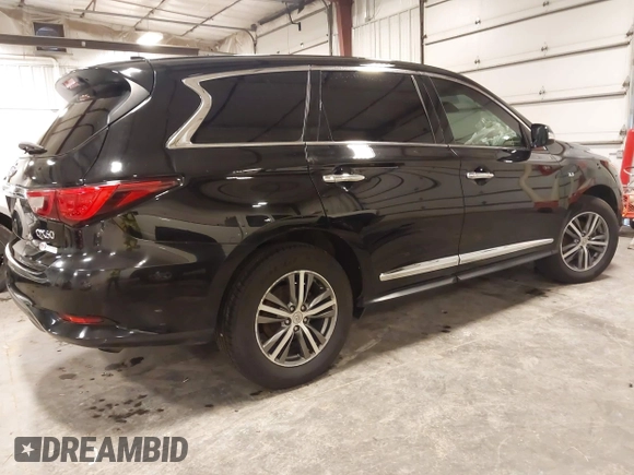 2019 Infiniti QX60 Luxe with VIN 5N1DL0MMXKC565309, listed as a IAAI auction lot 42184987 with 129,985 mi miles and . Bid and sale history available at DreamBid. Image 4.