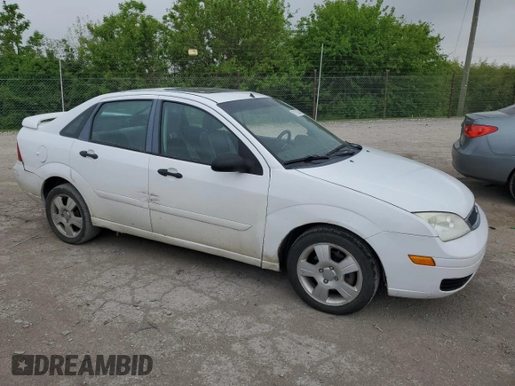 2007 Ford Focus S z VIN 1FAHP34N57W223198, wystawiony jako Copart lot #55725345 z przebiegiem 174 833 mil mil oraz Szkoda całkowita • Salvage title. Historia ofert i sprzedaży dostępna na DreamBid. Obrazek 4.