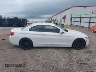 2018 BMW 4 Series 430i z VIN WBA4Z1C5XJEA31183, wystawiony jako IAAI lot #42133949 z przebiegiem 99 173 mil mil oraz . Historia ofert i sprzedaży dostępna na DreamBid. Obrazek 14.