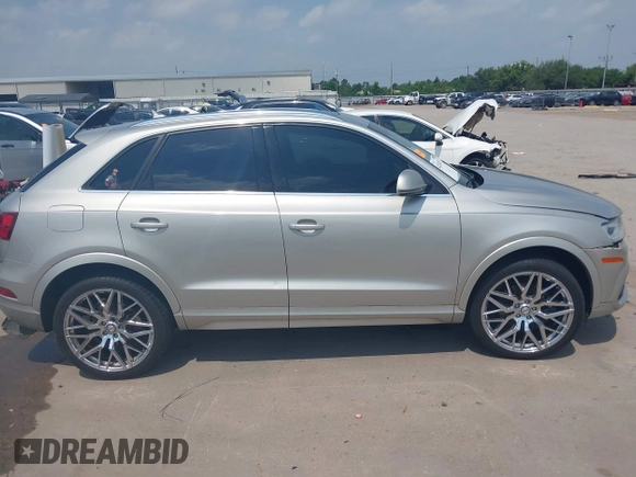 2016 Audi Q3 Premium Plus z VIN WA1EFCFS3GR002758, wystawiony jako IAAI lot #42262429 z przebiegiem 134 850 mil mil oraz . Historia ofert i sprzedaży dostępna na DreamBid. Obrazek 13.