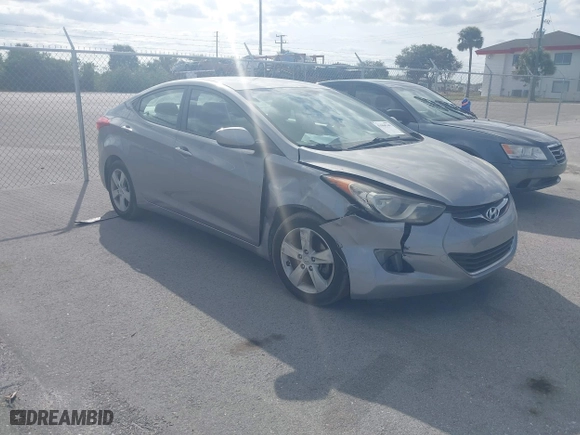 2013 Hyundai Elantra GLS PZEV with VIN KMHDH4AE9DU680860, listed as a IAAI auction lot 41068349 with 74,687 mi miles. Bid and sale history available at carsss.com. Image 1.