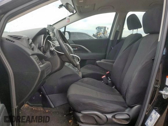 2012 Mazda 5 Sport with VIN JM1CW2BL6C0120288, listed as a Copart auction lot 60252315 with 127,494 mi miles and Salvage title. Bid and sale history available at DreamBid. Image 7.