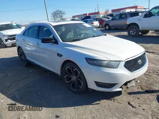 2014 Ford Taurus SHO with VIN 1FAHP2KT0EG164239, listed as a IAAI auction lot 41651825 with 218,919 mi miles. Bid and sale history available at carsss.com. Image 1.