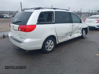 2010 Toyota Sienna XLE with VIN 5TDYK4CC1AS330349, listed as a IAAI auction lot 41607065 with 258,145 mi miles and . Bid and sale history available at carsss.com. Image 4.
