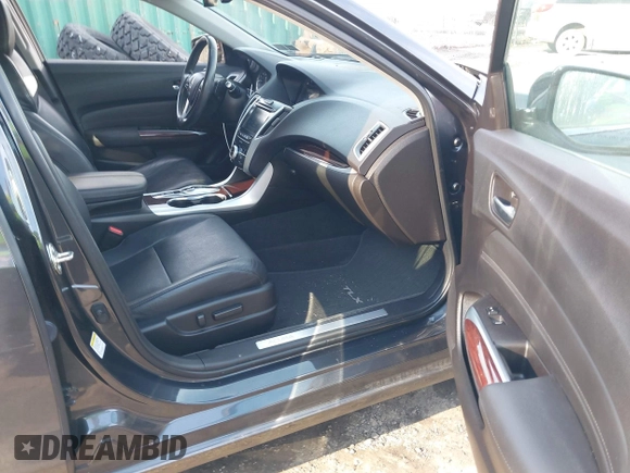 2016 Acura TLX Advance with VIN 19UUB3F7XGA003785, listed as a IAAI auction lot 41704559 with 123,251 mi miles and . Bid and sale history available at DreamBid. Image 5.