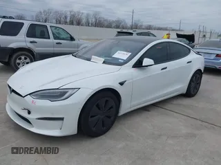 2021 Tesla Model S Plaid z VIN 5YJSA1E64MF452744, wystawiony jako IAAI lot #41375136 z przebiegiem Nie podano mil oraz . Historia ofert i sprzedaży dostępna na DreamBid. Obrazek 18.
