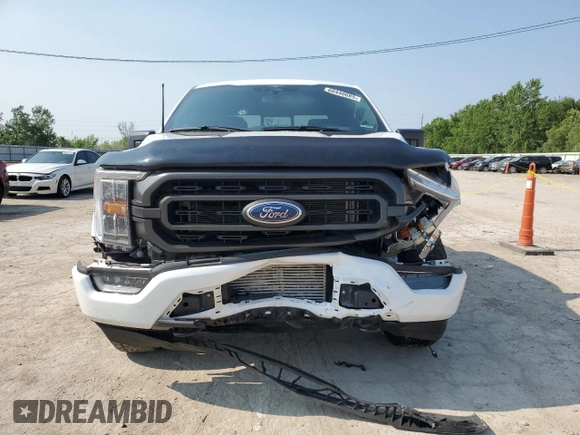 2023 Ford F-150 XL with VIN 1FTFW1E81PFA70563, listed as a Copart auction lot 60440685 with 31,198 mi miles and Salvage title. Bid and sale history available at DreamBid. Image 5.