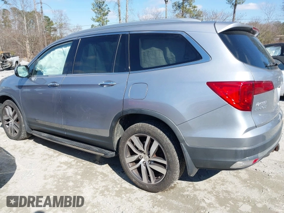 2017 Honda Pilot Touring with VIN 5FNYF6H94HB006873, listed as a IAAI auction lot 41618529 with 154,689 mi miles. Bid and sale history available at carsss.com. Image 3.