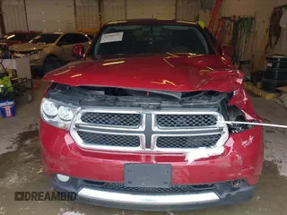 2013 Dodge Durango SXT with VIN 1C4RDJAG4DC527945, listed as a IAAI auction lot 41590545 with 141,074 mi miles and . Bid and sale history available at DreamBid. Image 13.