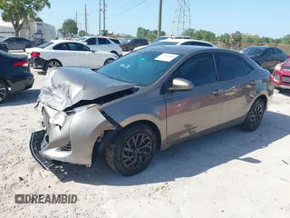 2019 Toyota Corolla L with VIN 5YFBURHE7KP878972, listed as a IAAI auction lot 42000888 with 201,612 mi miles. Bid and sale history available at carsss.com. Image 17.