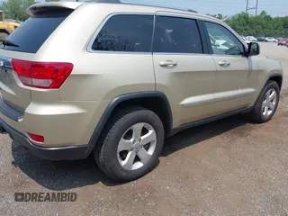 2011 Jeep Grand Cherokee Laredo with VIN 1J4RR4GG0BC713919, listed as a IAAI auction lot 42425229 with 139,379 mi miles and . Bid and sale history available at DreamBid. Image 4.