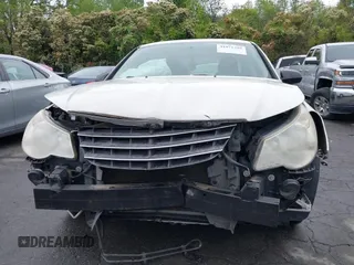 2010 Chrysler Sebring Touring with VIN 1C3CC4FB5AN229593, listed as a IAAI auction lot 41971326 with 144,561 mi miles and . Bid and sale history available at DreamBid. Image 12.
