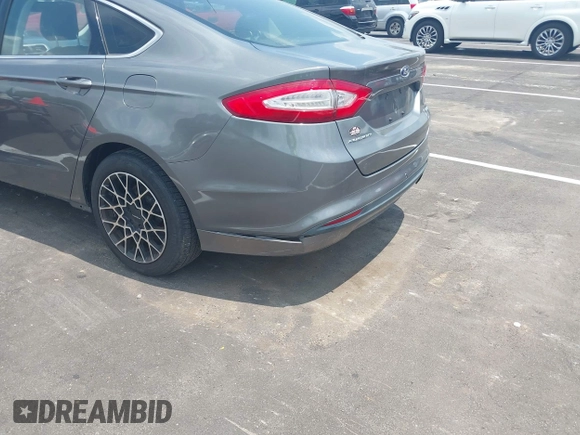 2013 Ford Fusion SE z VIN 3FA6P0HR7DR229960, wystawiony jako IAAI lot #42433104 z przebiegiem 167 485 mil mil oraz . Historia ofert i sprzedaży dostępna na DreamBid. Obrazek 6.