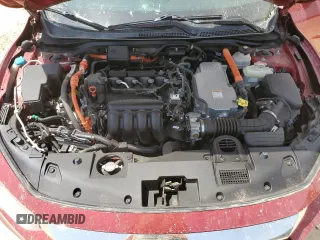 2022 Honda Insight Touring z VIN 19XZE4F95NE002847, wystawiony jako Copart lot #51352875 z przebiegiem 53 229 mil mil oraz Czysty tytuł • Clean title. Historia ofert i sprzedaży dostępna na DreamBid. Obrazek 11.
