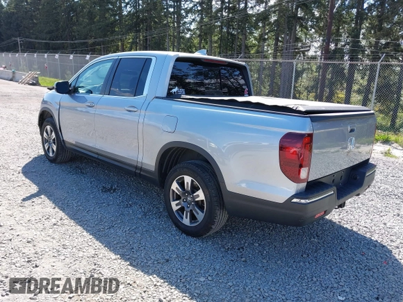 2019 Honda Ridgeline RTL with VIN 5FPYK3F54KB018272, listed as a IAAI auction lot 42184895 with 75,362 mi miles and . Bid and sale history available at DreamBid. Image 3.