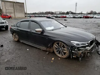 2018 BMW 7 Series M760i xDrive with VIN WBA7H6C58JG614544, listed as a Copart auction lot 70382702 with 0 mi miles. Bid and sale history available at carsss.com. Image 4.
