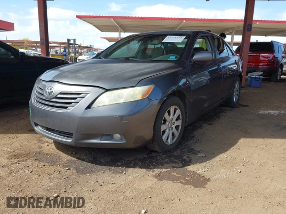 2007 Toyota Camry CE with VIN 4T1BE46KX7U008924, listed as a IAAI auction lot 42171072 with 254,303 mi miles and . Bid and sale history available at DreamBid. Image 2.