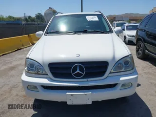 2002 Mercedes-Benz M 320/430/500 z VIN 4JGAB54E92A362578, wystawiony jako IAAI lot #42171526 z przebiegiem 172 623 mil mil oraz . Historia ofert i sprzedaży dostępna na DreamBid. Obrazek 6.