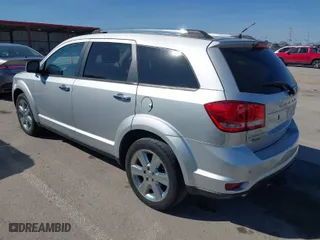 2014 Dodge Journey Limited with VIN 3C4PDCDG7ET219835, listed as a IAAI auction lot 41755551 with 151,332 mi miles. Bid and sale history available at carsss.com. Image 3.