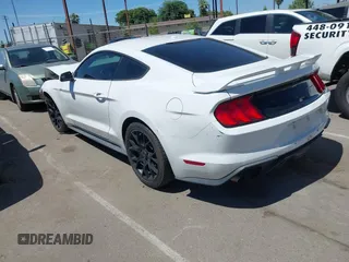2019 Ford Mustang EcoBoost with VIN 1FA6P8TH4K5131093, listed as a IAAI auction lot 42335837 with 101,244 mi miles and . Bid and sale history available at DreamBid. Image 3.