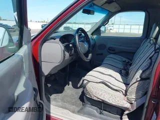 1998 Ford F-150 with VIN 1FTZF182XWKA36602, listed as a IAAI auction lot 42472442 with 112,235 mi miles and . Bid and sale history available at DreamBid. Image 5.