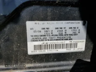 2006 Mazda Mazda3 i with VIN JM1BK12G561541017, listed as a Copart auction lot 74117774 with Not Provided miles and Salvage Title. Bid and sale history available at carsss.com. Image 12.