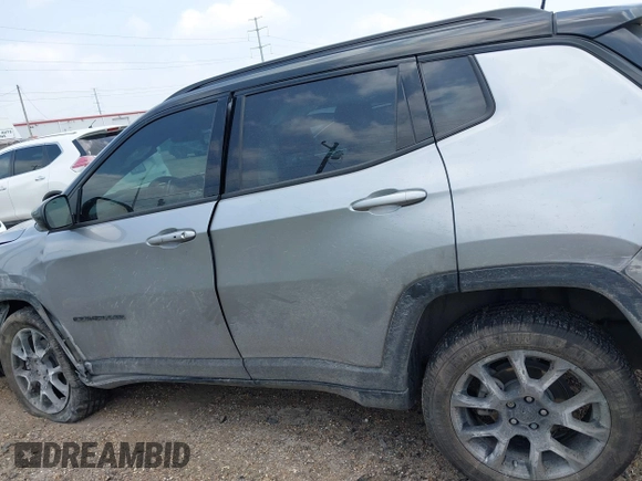 2023 Jeep Compass Latitude with VIN 3C4NJDBN5PT509999, listed as a IAAI auction lot 42206354 with 62,165 mi miles and . Bid and sale history available at DreamBid. Image 14.