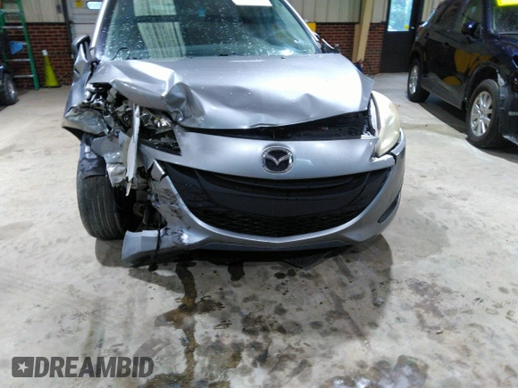2013 Mazda 5 Sport with VIN JM1CW2BL5D0156684, listed as a IAAI auction lot 41966696 with 121,654 mi miles and . Bid and sale history available at DreamBid. Image 6.