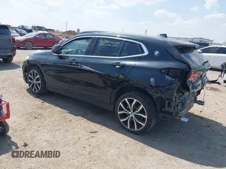 2018 BMW X2 xDrive28i with VIN WBXYJ5C33JEF80454, listed as a IAAI auction lot 41876188 with 34,596 mi miles. Bid and sale history available at carsss.com. Image 3.
