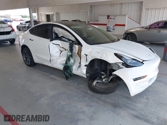 2023 Tesla Model 3 z VIN 5YJ3E1EAXPF606178, wystawiony jako IAAI lot #42543528 z przebiegiem 26 638 mil mil oraz . Historia ofert i sprzedaży dostępna na DreamBid. Obrazek 1.