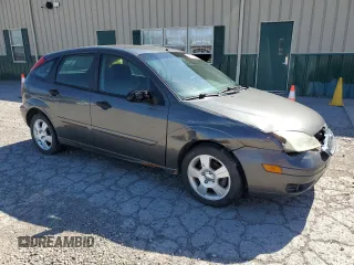 2005 Ford Focus S z VIN 3FAFP37N25R133770, wystawiony jako Copart lot #54927585 z przebiegiem 179 959 mil mil oraz Nie do naprawy. Historia ofert i sprzedaży dostępna na DreamBid. Obrazek 4.