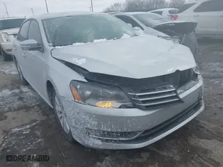2015 Volkswagen Passat 1.8T Limited Edition with VIN 1VWAT7A38FC033801, listed as a IAAI auction lot 41415076 with 94,283 mi miles. Bid and sale history available at carsss.com. Image 1.