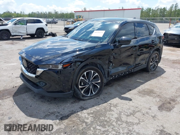 2023 Mazda CX-5 2.5 S Premium Plus Package with VIN JM3KFBEM5P0256652, listed as a IAAI auction lot 41936376 with 31,332 mi miles. Bid and sale history available at carsss.com. Image 17.