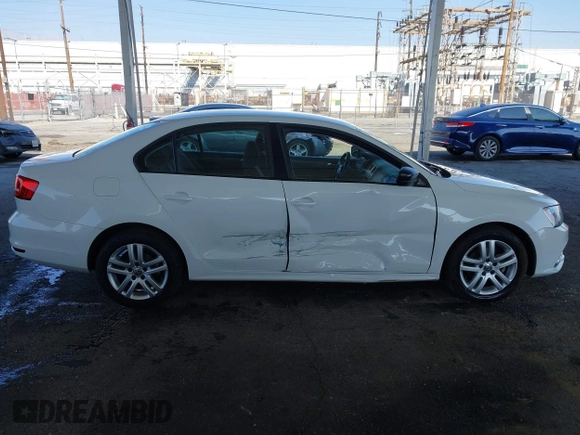 2015 Volkswagen Jetta Sedan 2.0L S with VIN 3VW2K7AJ3FM253125, listed as a IAAI auction lot 41535632 with 103,953 mi miles. Bid and sale history available at carsss.com. Image 13.