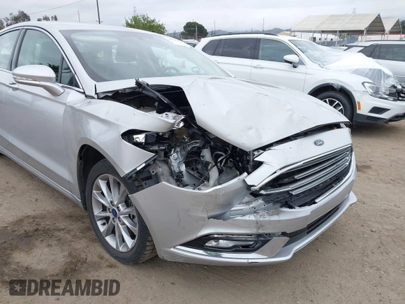 2017 Ford Fusion Energi SE with VIN 3FA6P0PU9HR354096, listed as a IAAI auction lot 42064703 with 69,601 mi miles. Bid and sale history available at carsss.com. Image 6.