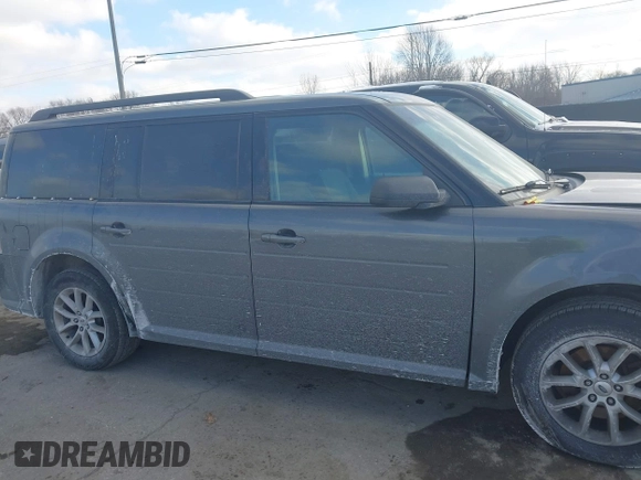 2016 Ford Flex SE with VIN 2FMGK5B88GBA18405, listed as a IAAI auction lot 40764055 with 285,137 mi miles. Bid and sale history available at carsss.com. Image 14.